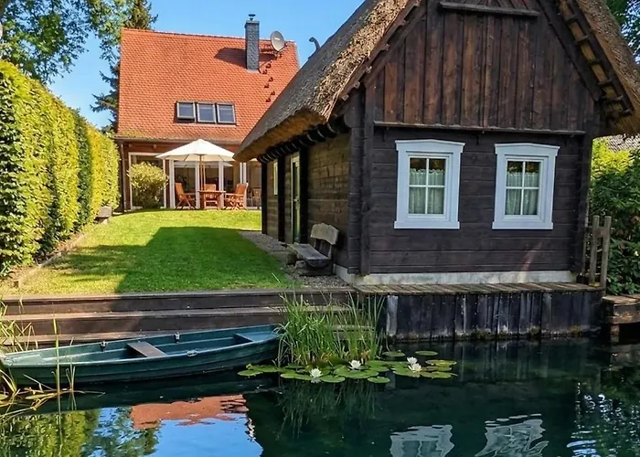 Photo de Ferienhaus Fliess Paradies Mit Privatem Saunahaus - Leipe, Spreewald